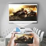 Extreme motorcycle crash scene with flames and destruction displayed on a large screen.