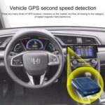 GPS vehicle tracker on car dashboard for second speed detection, showing digital interface and magnetic field sensor device.