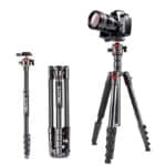 Angled view of professional camera and tripod for photography, versatile camera gear setup for travel and studio photography, on a white background.